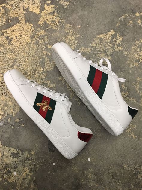 fake gucci bee sneakers|Gucci ace bee platform sneakers.